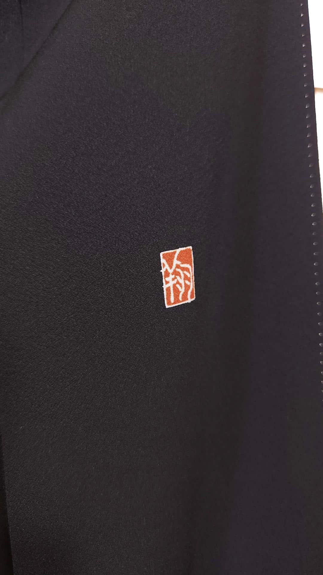 Black Kuro Tomesode with golden poetic motifs