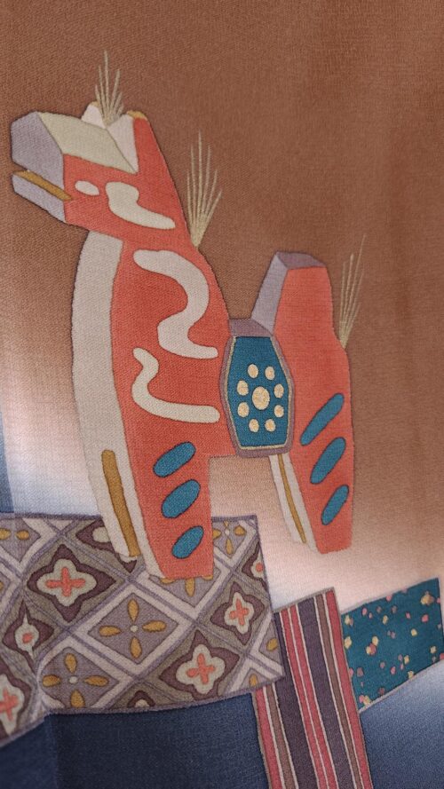 Brown Hōmongi with stylized animal motifs