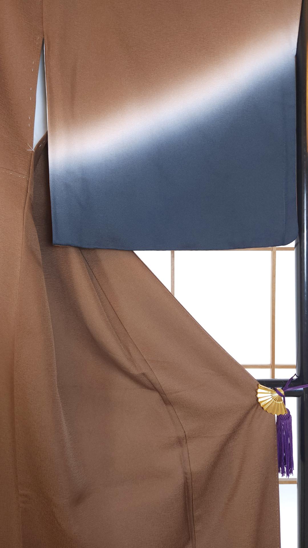 Brown Hōmongi with stylized animal motifs