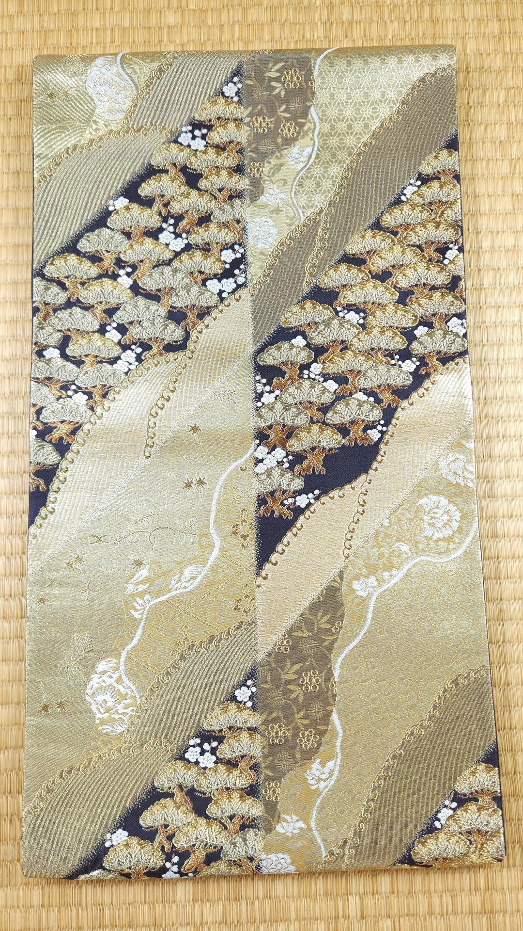 Golden Fukuro Obi embroidered pine trees black background