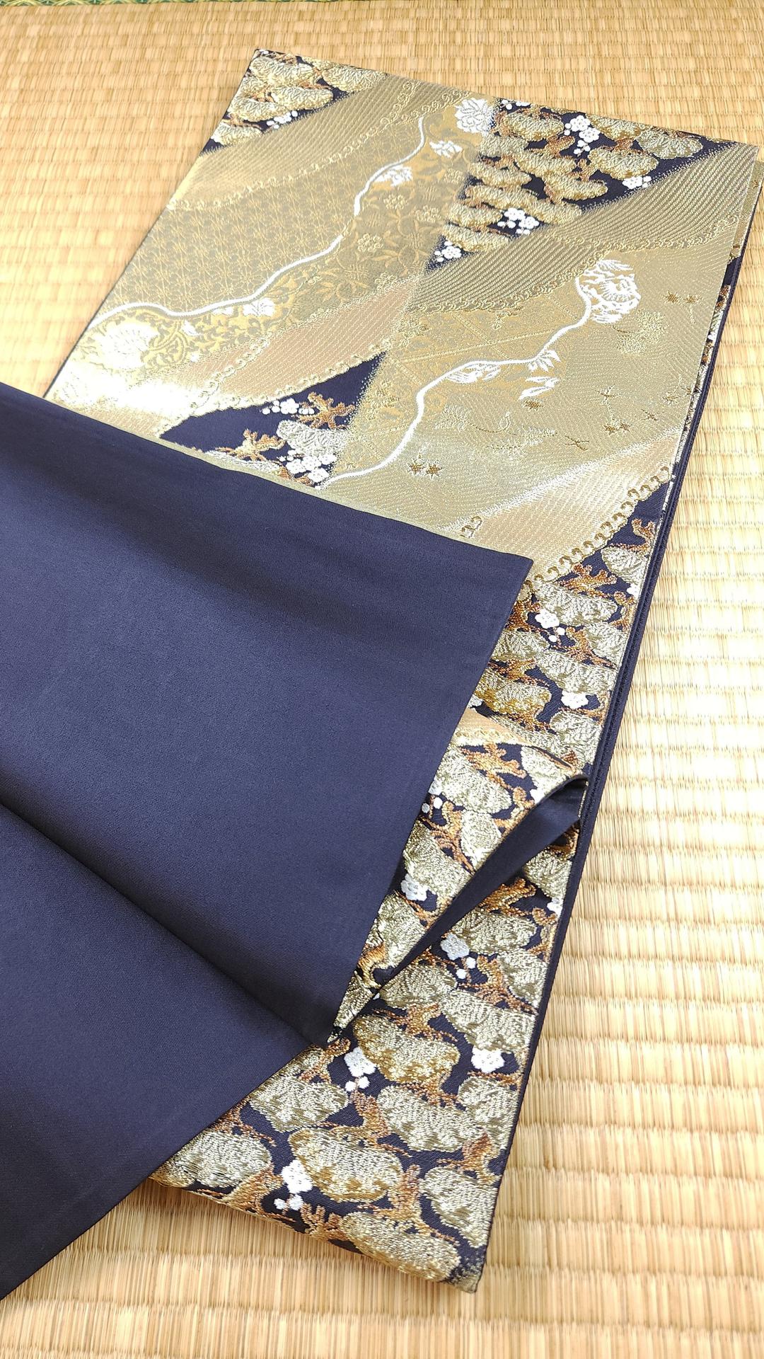 Golden Fukuro Obi embroidered pine trees black background