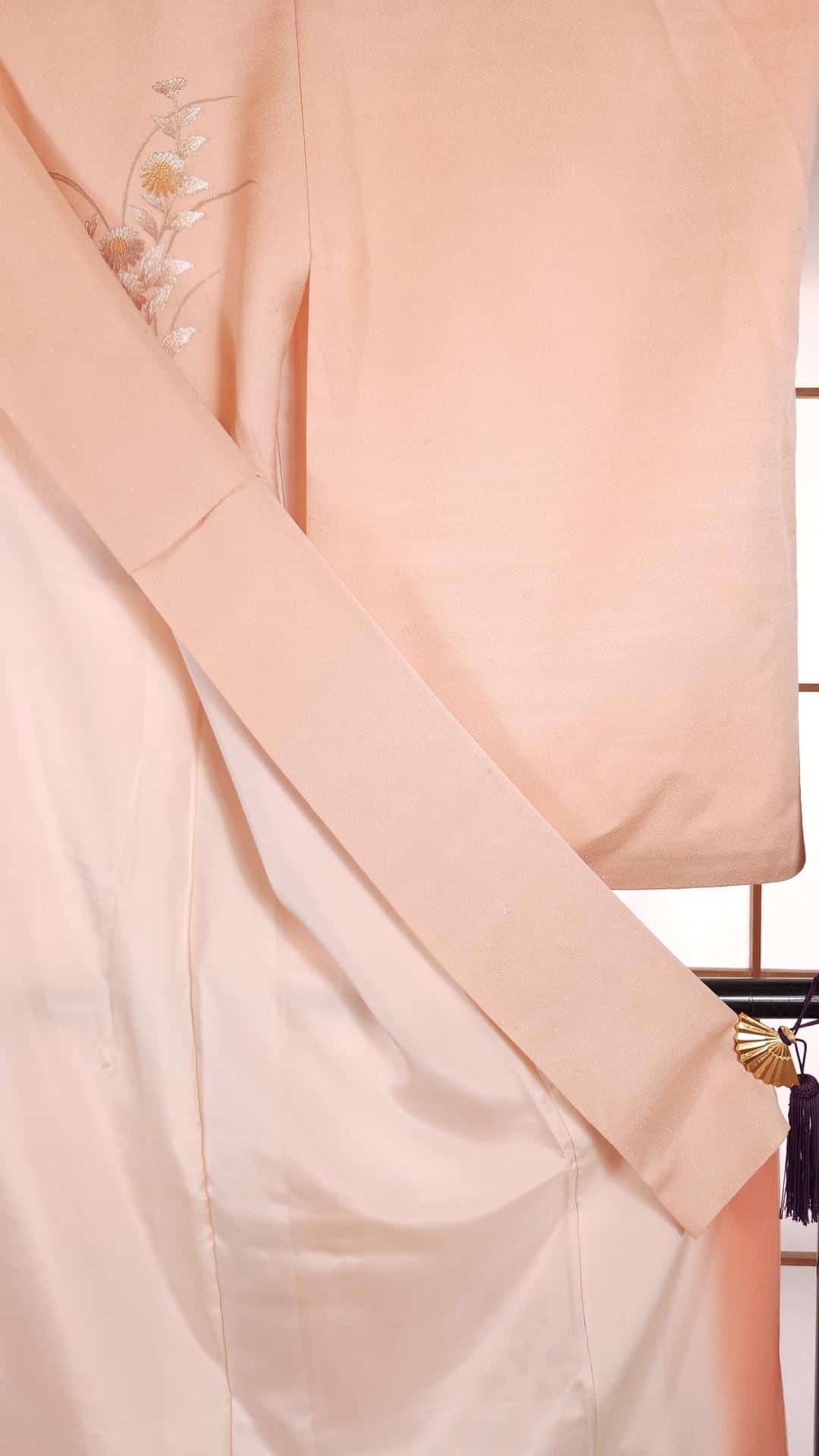 Peach pink Houmongi with golden floral motifs