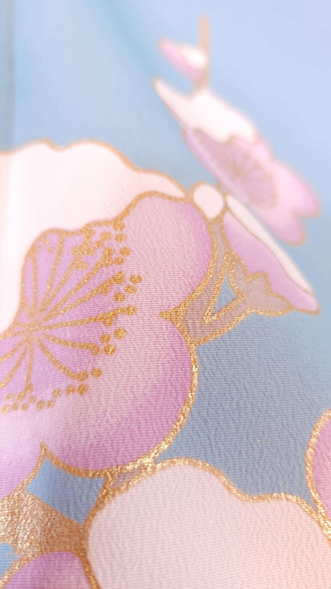 Sky blue Houmongi with golden Ume blossoms
