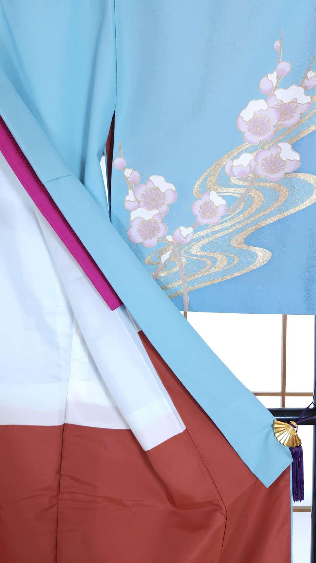 Sky blue Houmongi with golden Ume blossoms