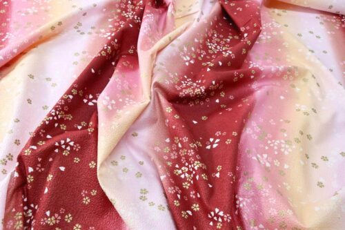 Japanese cotton chirimen fabric Sakura on red gradient