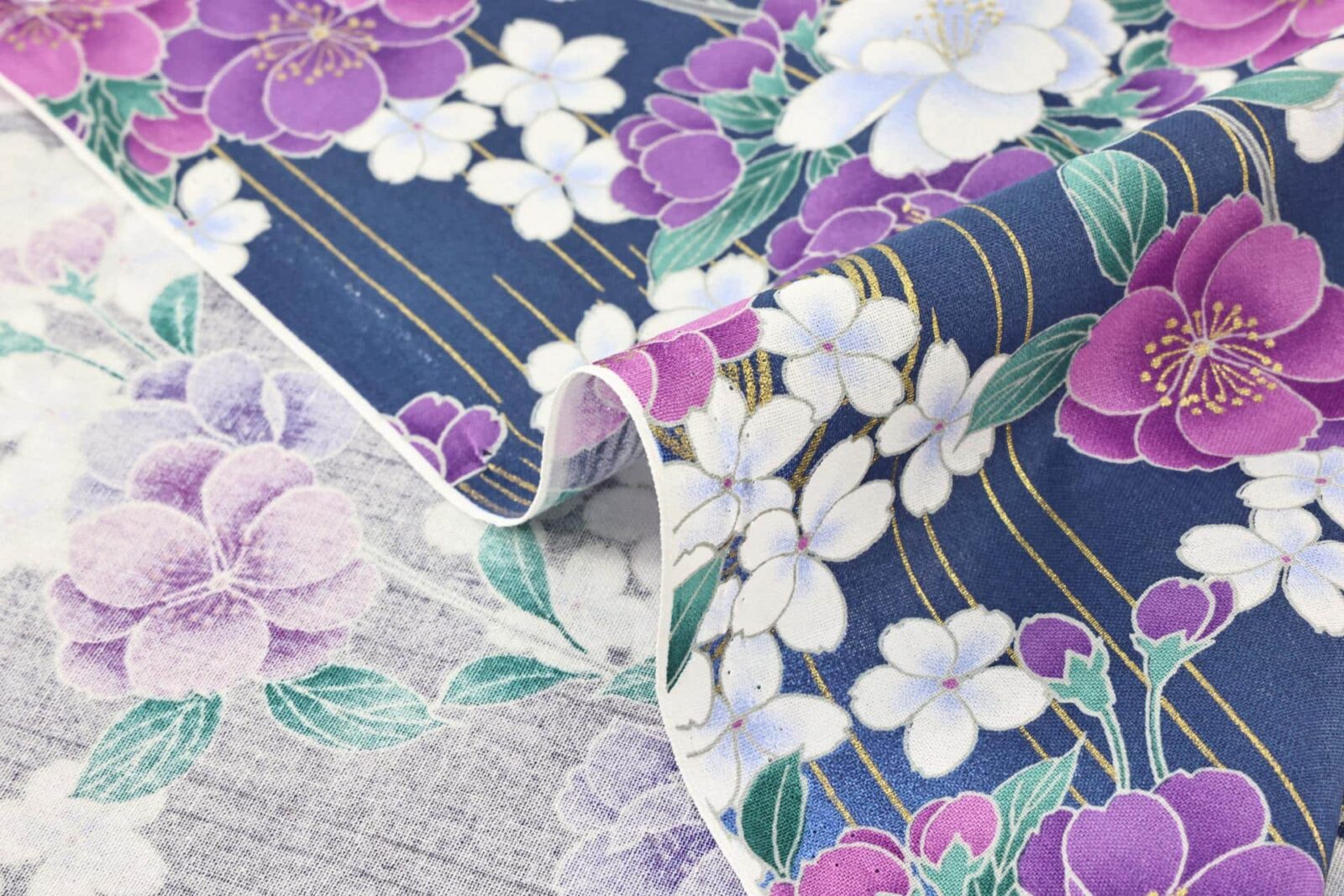 Japanese fabric golden sakura bouquets blue background
