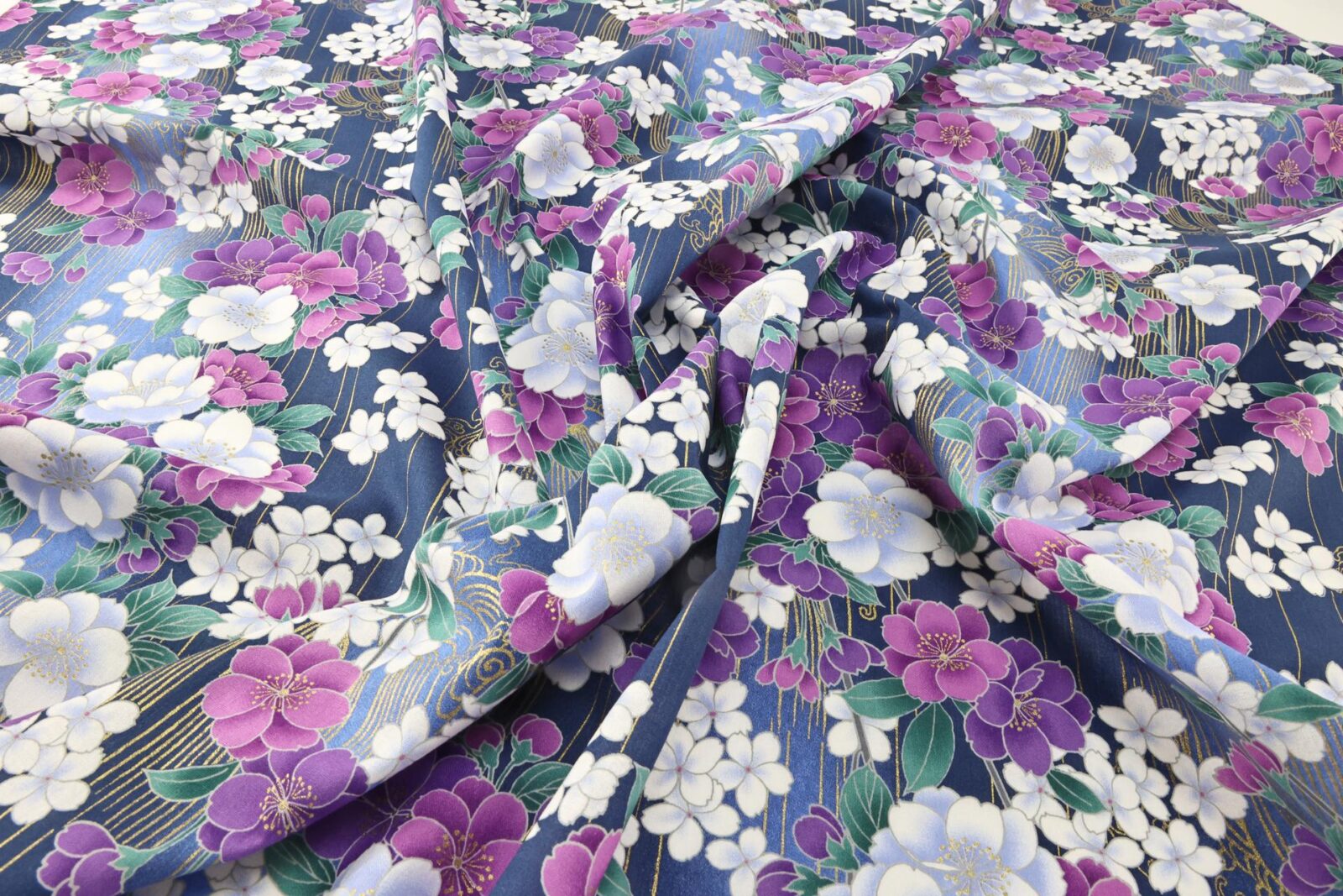 Japanese fabric golden sakura bouquets blue background
