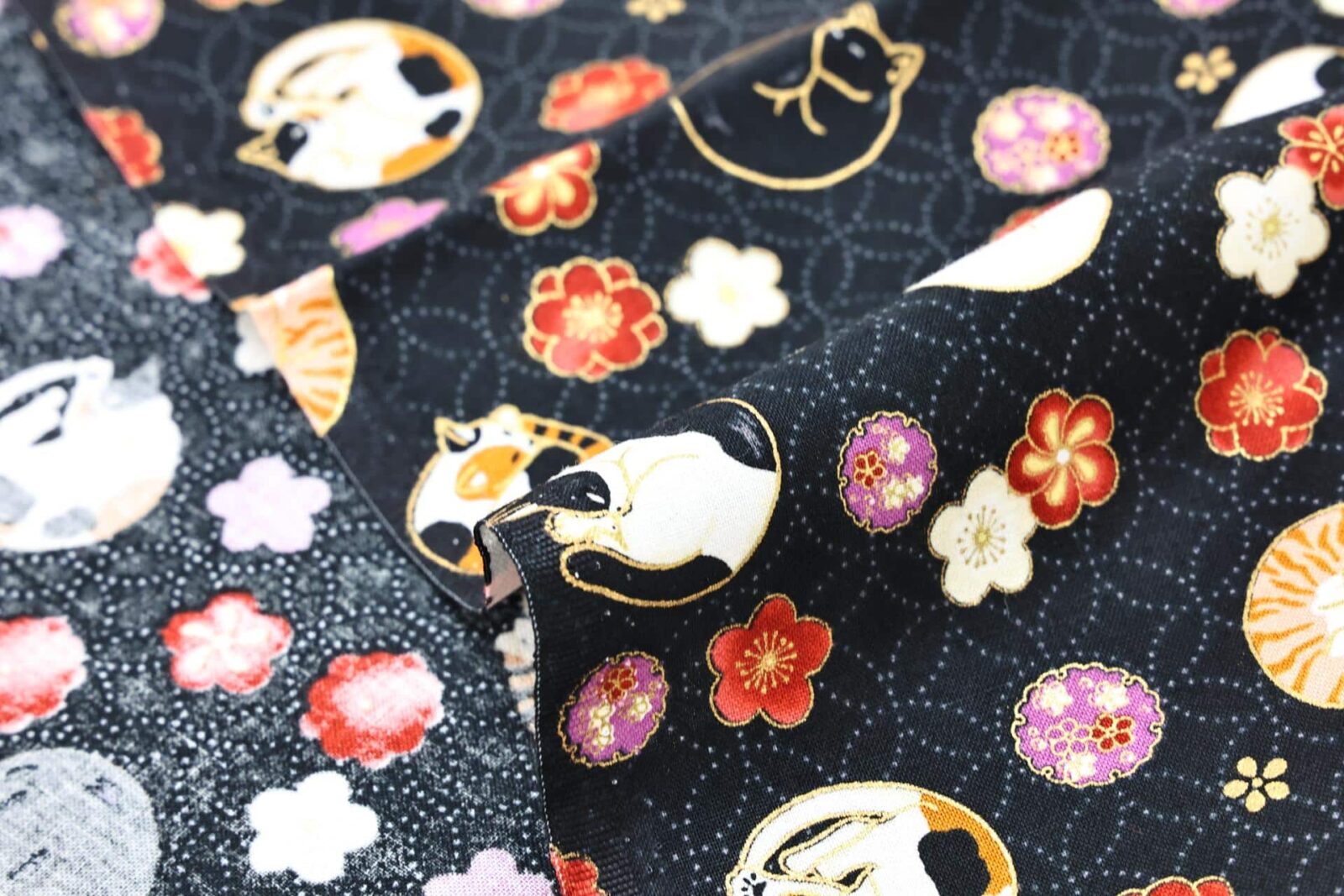 Japanese fabric sleeping cats and Ume black background