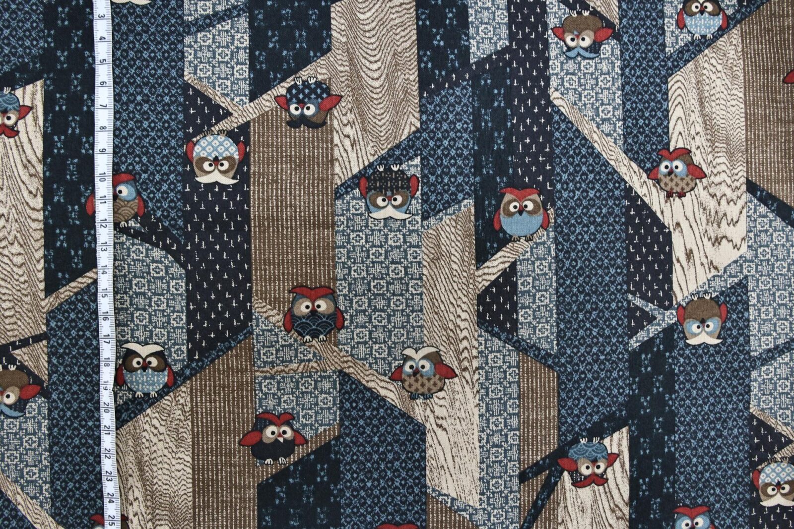 Japanese fabric with owls on stylized trees