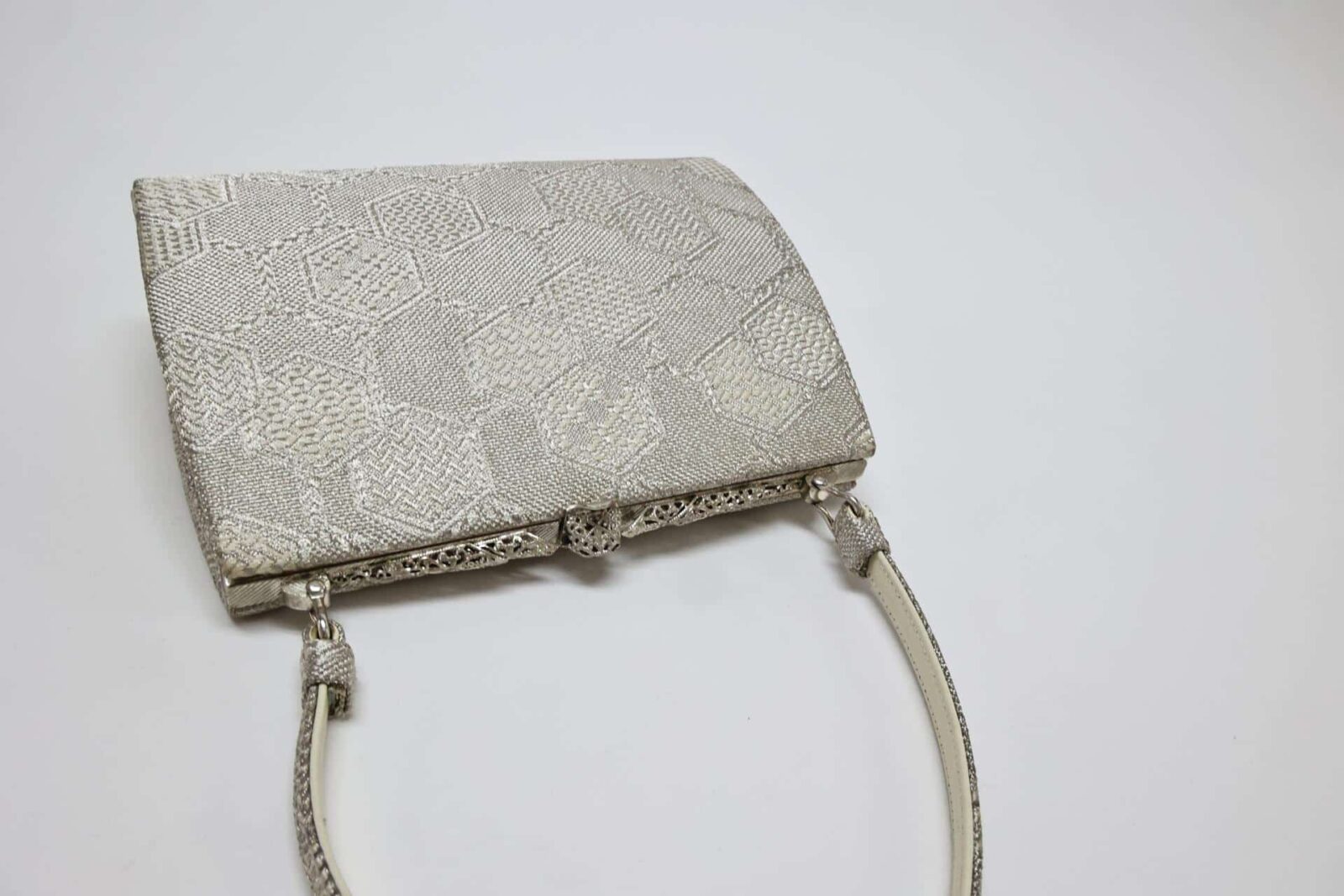 Silver brocade kimono bag with Kikkō pattern