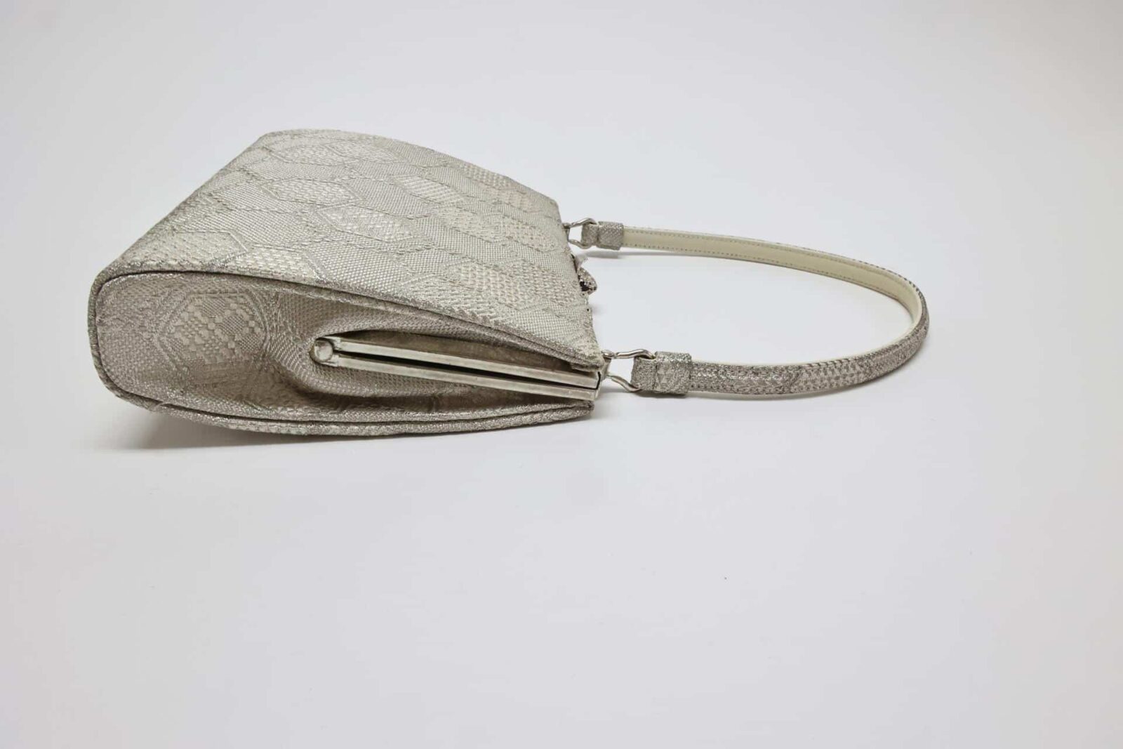 Silver brocade kimono bag with Kikkō pattern