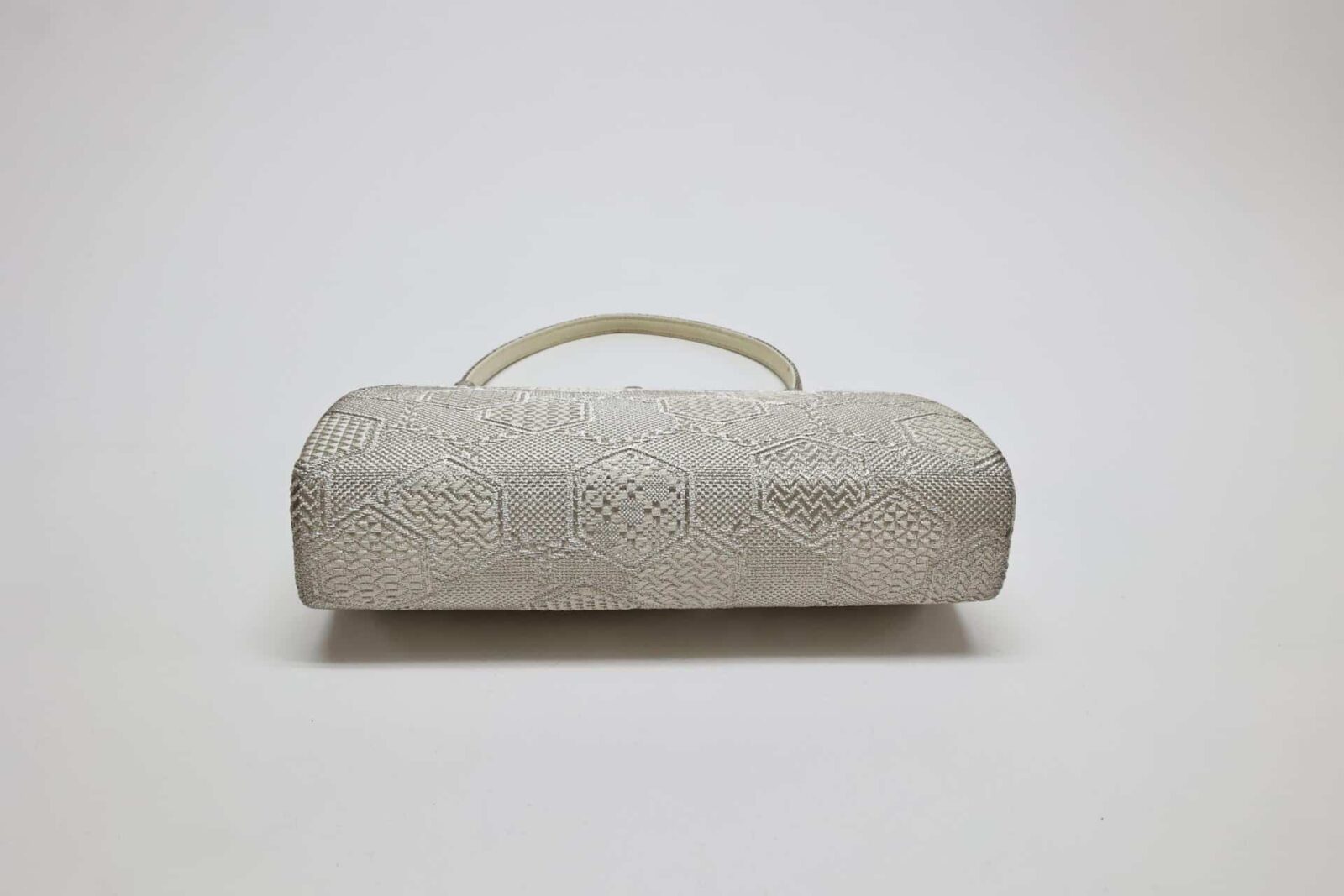 Silver brocade kimono bag with Kikkō pattern