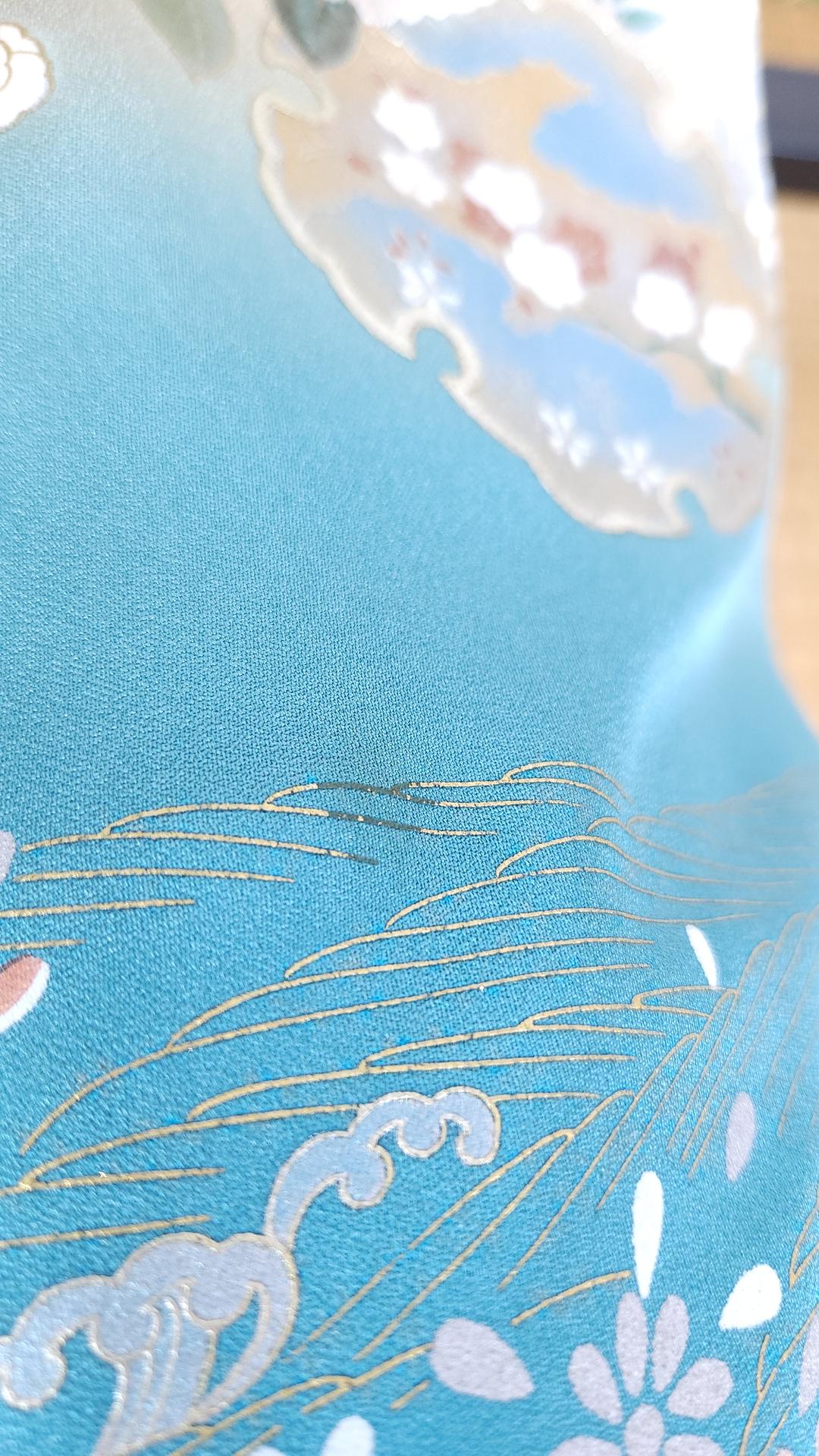 Sky blue Houmongi Kimono with flowers and Yukiwa