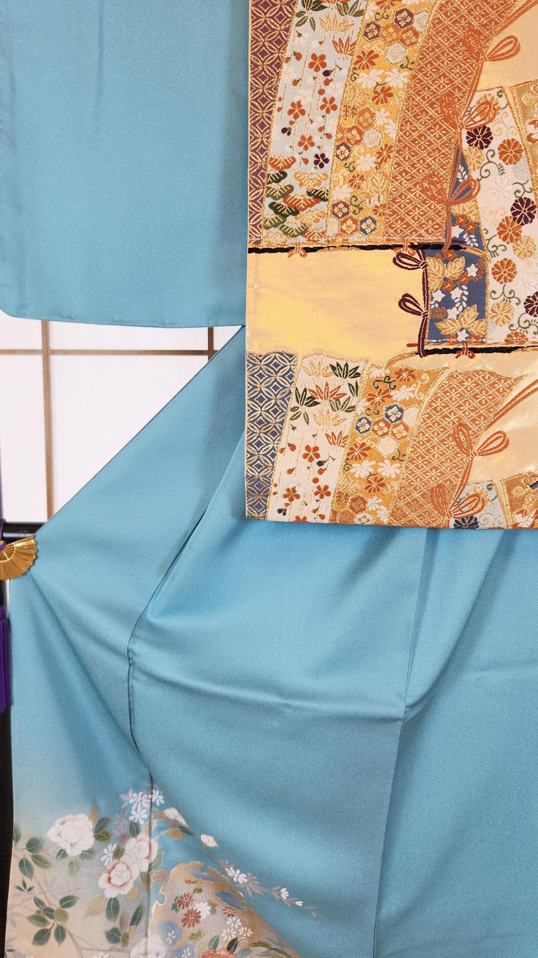 Sky blue Houmongi Kimono with flowers and Yukiwa