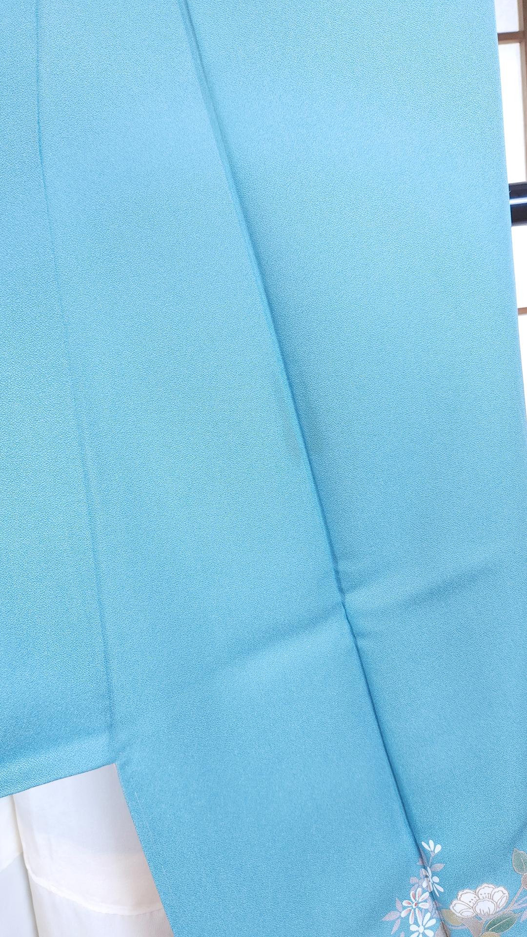 Sky blue Houmongi Kimono with flowers and Yukiwa