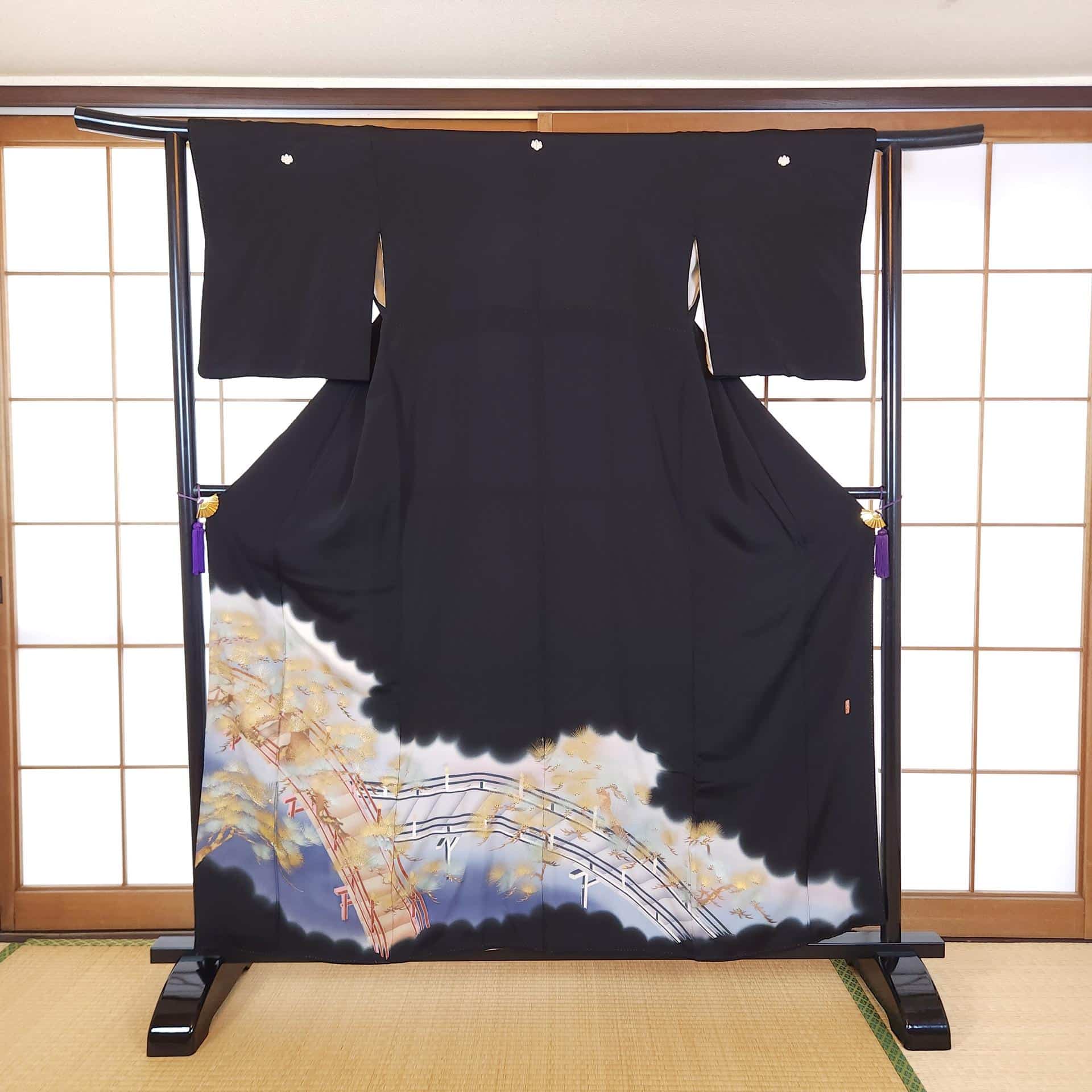 Kuro Tomesode bridge and golden pines