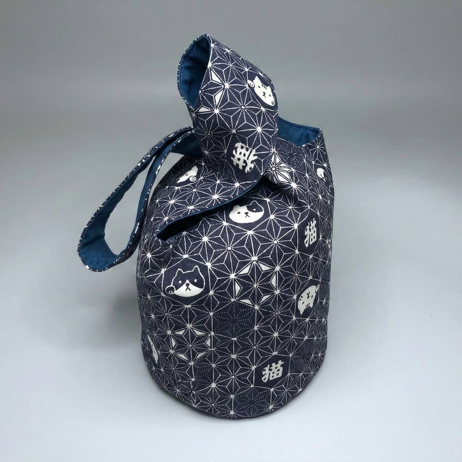 Japanese knot bag handmade with indigo asanoha and maneki neko Japanese fabrics from DIY District