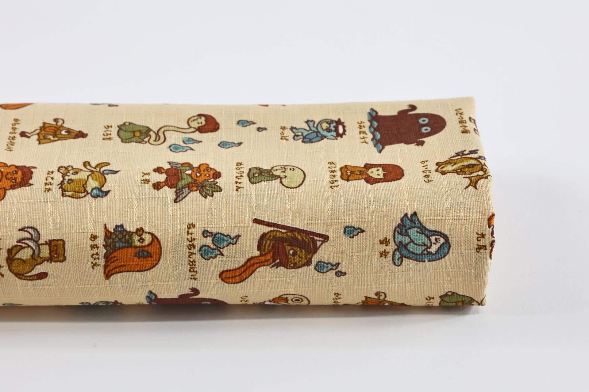 Japanese Yokai cotton dobby fabric peach background