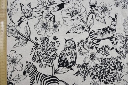 Tissu japonais Echino animaux de la savane à l’encre noire sur fond écru, à plat avec règle
