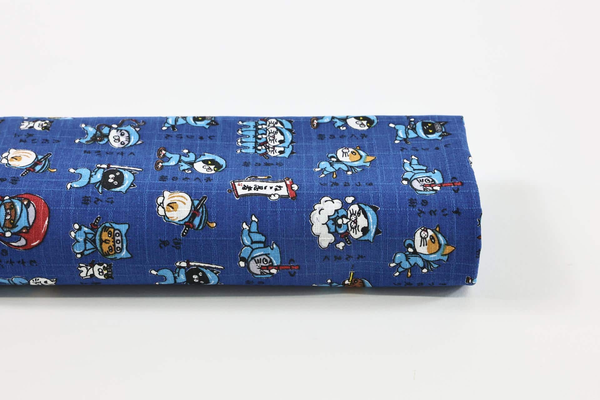 Japanese Neko Ninja fabric on blue