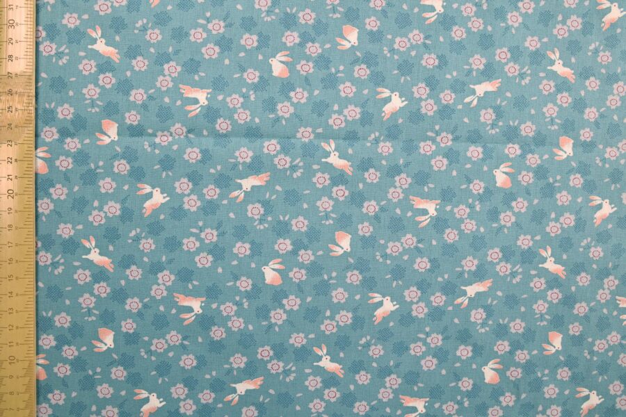 Japanese cotton fabric with rabbits and sakura on light blue