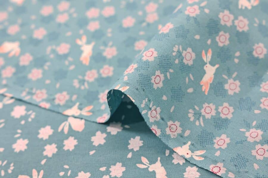 Japanese cotton fabric with rabbits and sakura on light blue