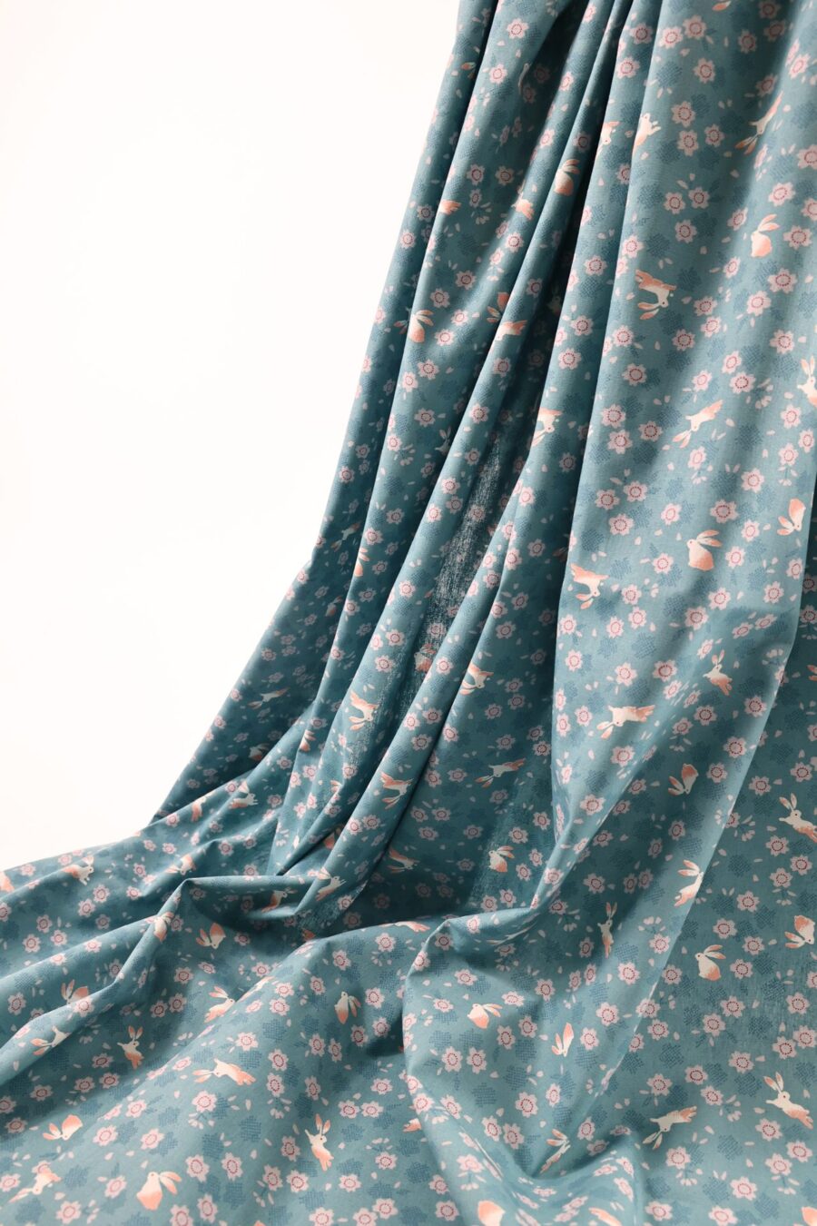 Japanese cotton fabric with rabbits and sakura on light blue