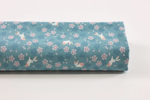 Japanese cotton fabric with rabbits and sakura on light blue