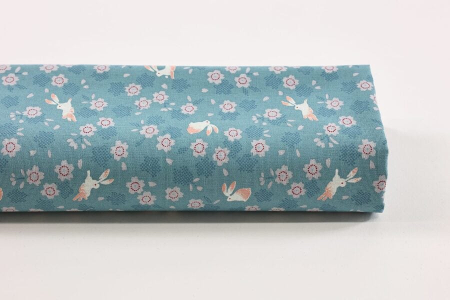 Japanese cotton fabric with rabbits and sakura on light blue