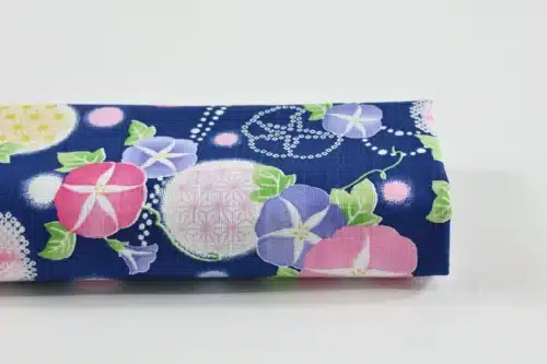 Japanese morning glory asagao fabric with pink and mauve flowers on a navy blue background