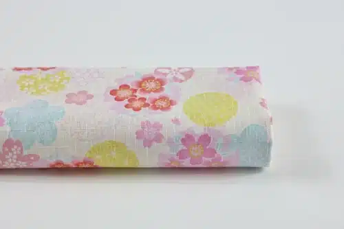 Tissu japonais dobby sakura et cercles yukiwa pastel sur fond ivoire