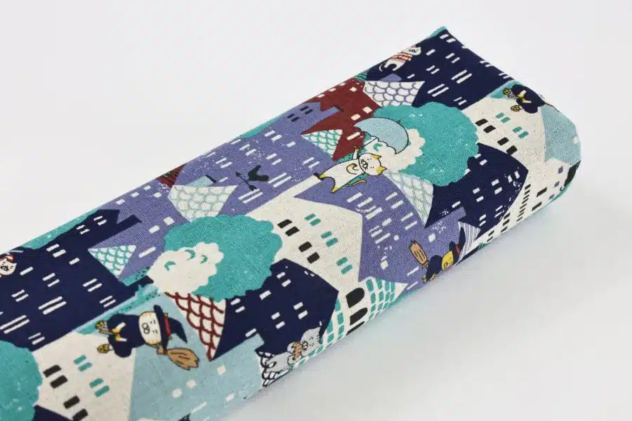 Japanese witch cat village fabric blue, Kobayashi cotton and linen canvas, fabric roll on white background