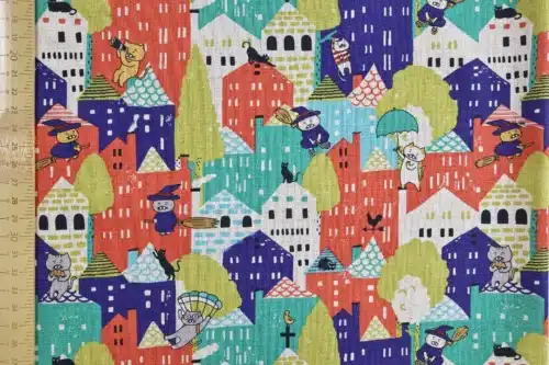 Japanese witch cat village fabric multicolor, Kobayashi cotton and linen canvas, flat view with ruler
