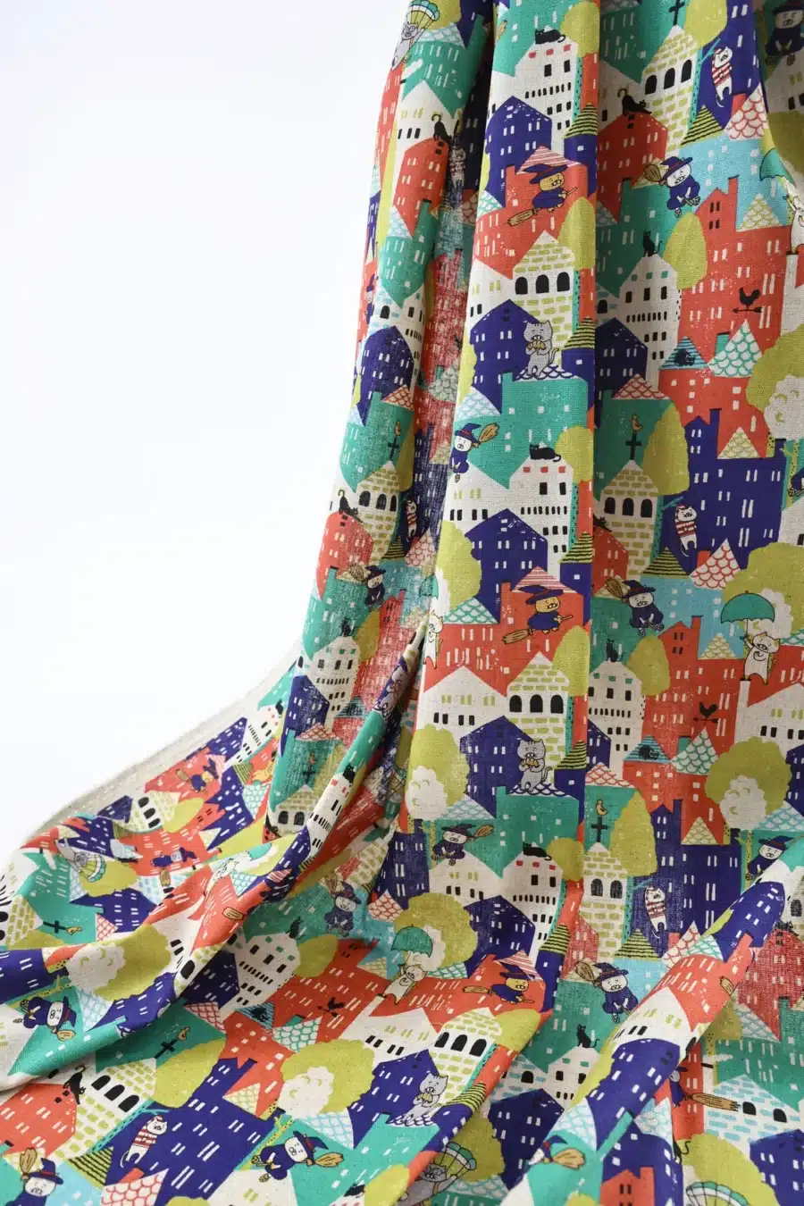 Japanese witch cat village fabric multicolor, Kobayashi cotton and linen canvas, draped
