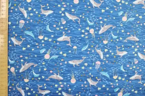 Japanese double gauze whale and dolphin fabric blue background, flat with ruler