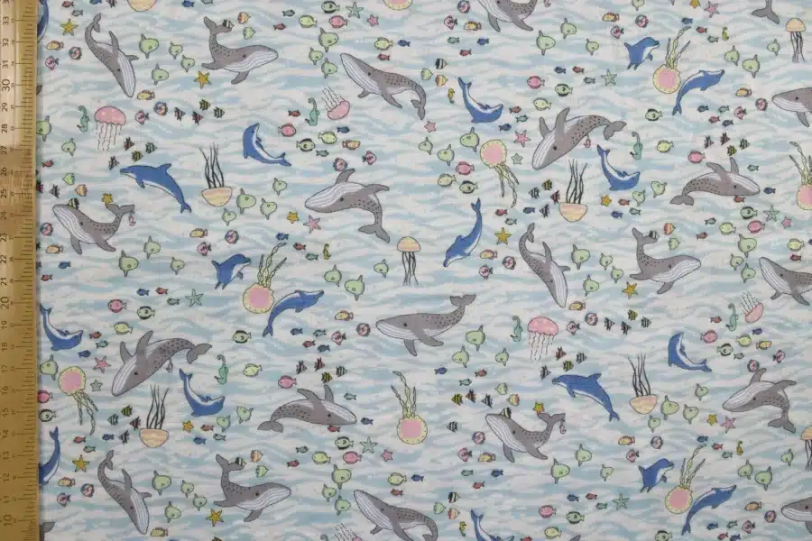 Japanese double gauze whale and dolphin fabric white background, flat with ruler