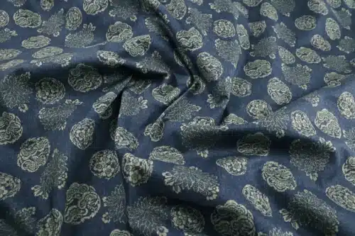 Japanese hanamaru floral medallions fabric navy blue background, draped