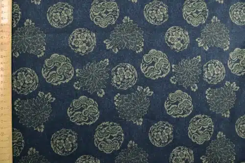 Japanese hanamaru floral medallions fabric navy blue background, flat with ruler