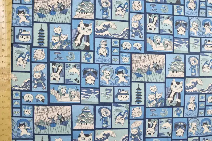 Tissu Japonais chats ukiyo-e fond bleu, vue à plat avec la règle