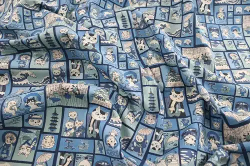 Tissu Japonais chats ukiyo-e fond bleu, drapé à plat