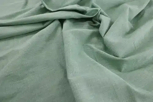Tissu Japonais uni coton flammé vert sauge - vue drapée